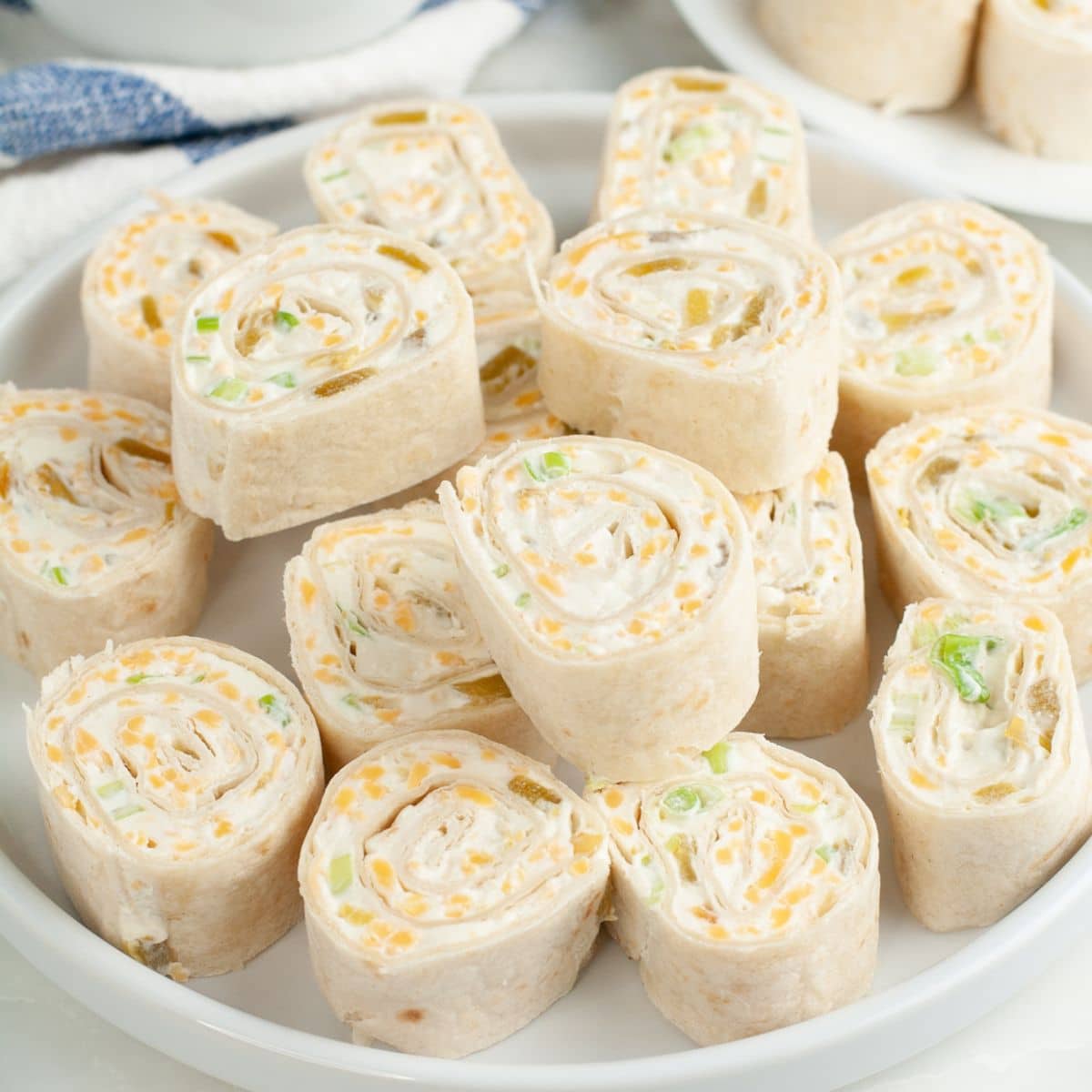 Plate of green chile pinwheels.