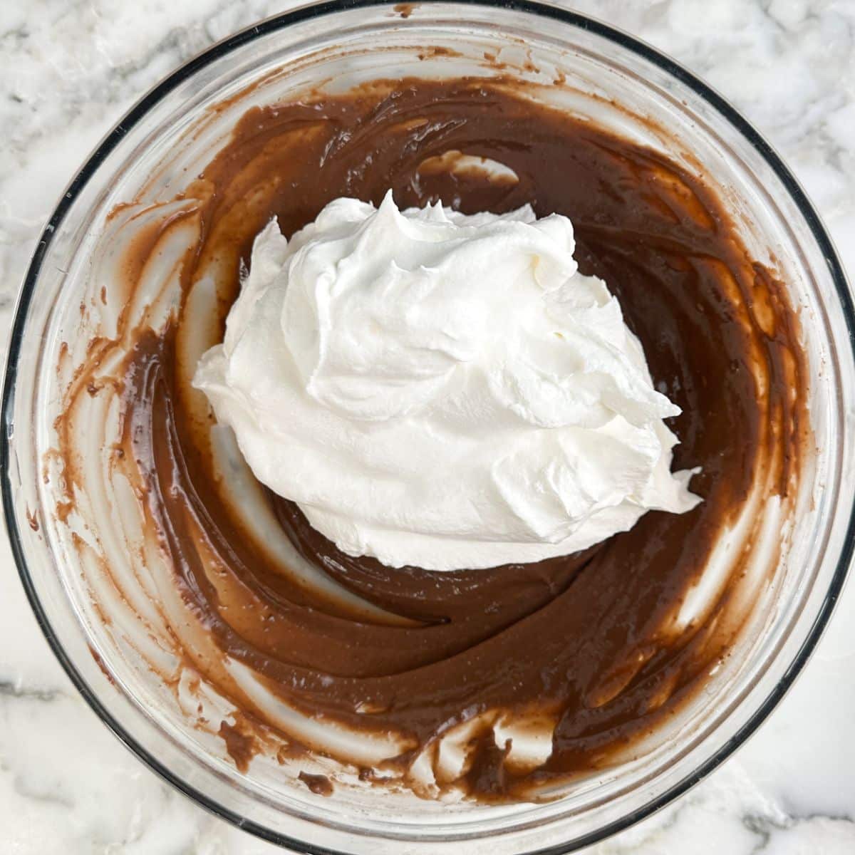 Bowl of chocolate pudding with Cool Whip.
