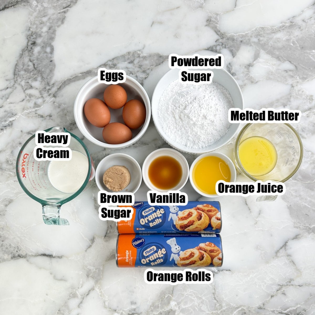 Orange rolls, cream, powdered sugar, eggs, orange juice, brown sugar, butter, and vanilla.