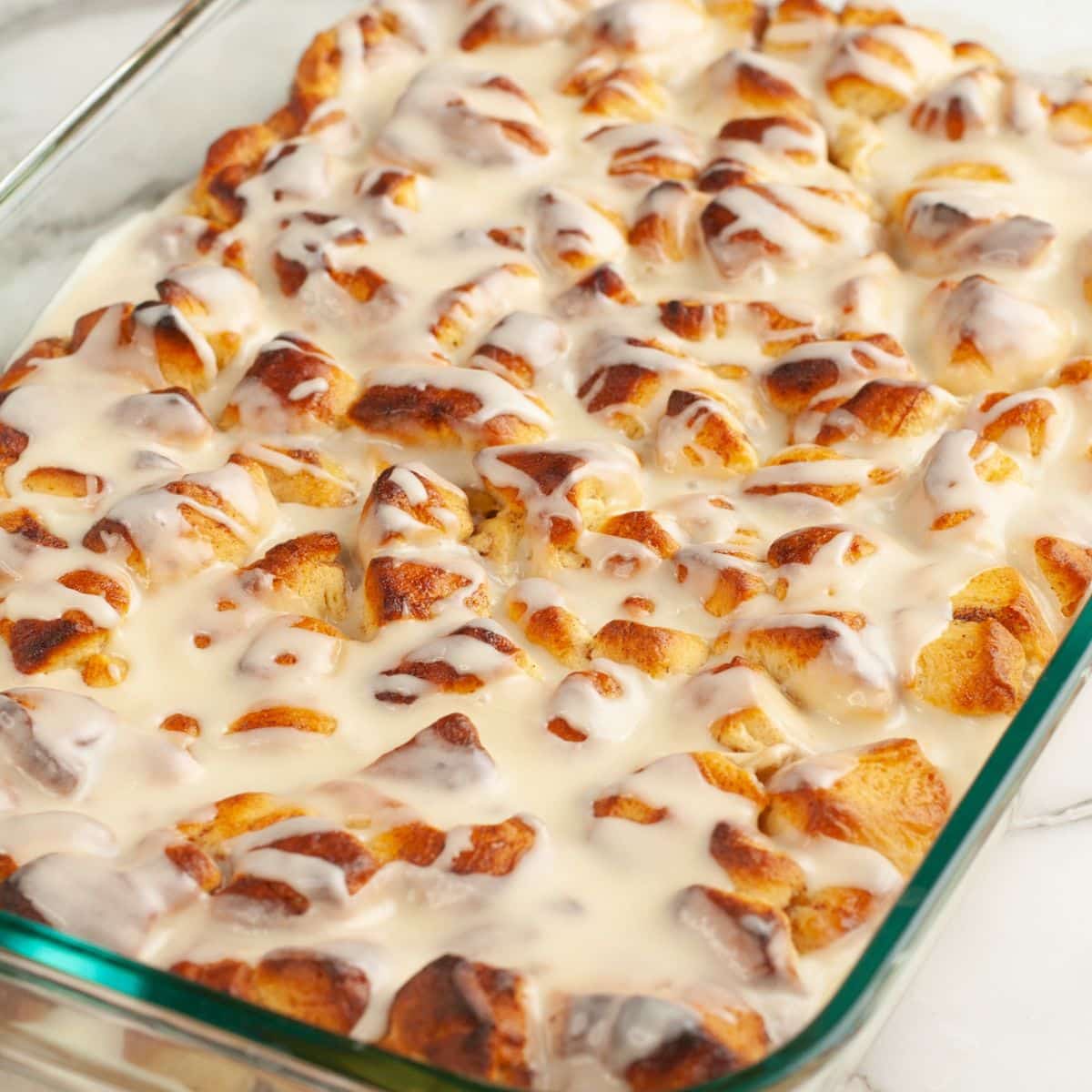 Casserole dish with orange roll casserole.