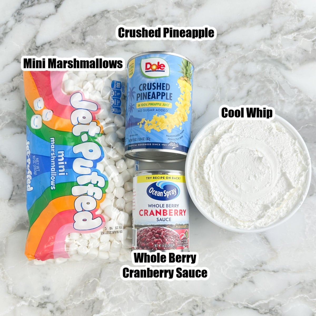 Bag of mini marshmallows, crushed pineapple, canned cranberry sauce, and Cool Whip.