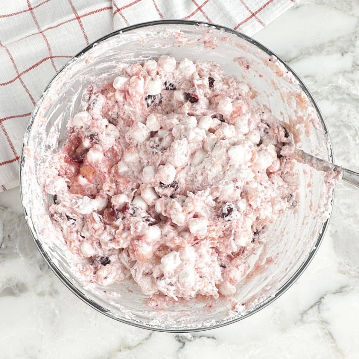 Bowl of cranberry fluff salad.