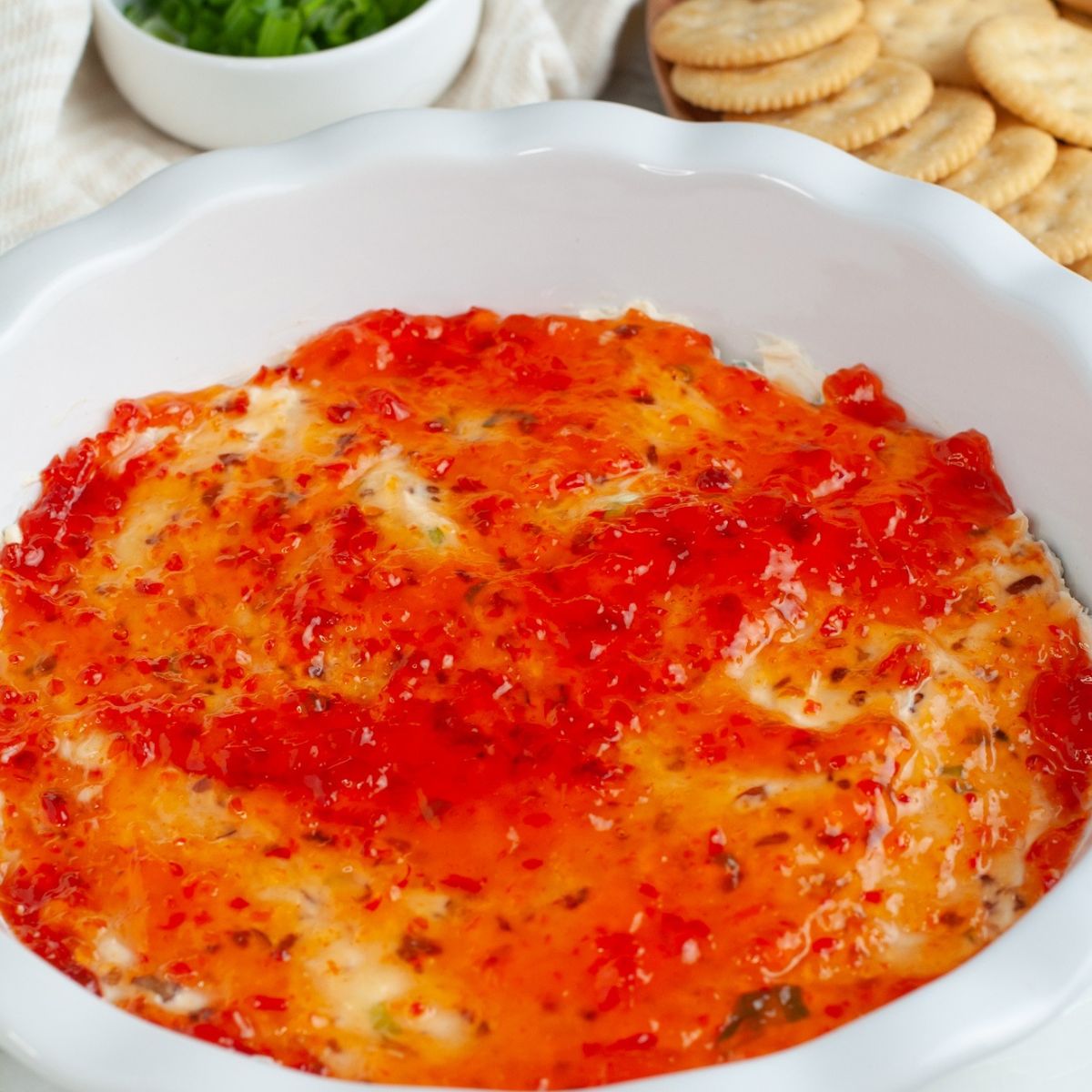Baking dish with pepper jelly cream cheese dip.