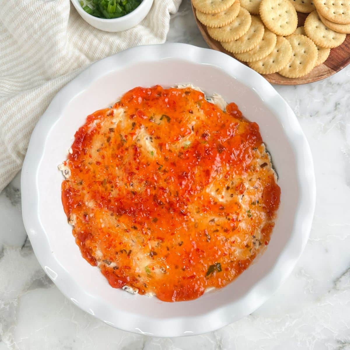 Pie dish with pepper jelly dip.